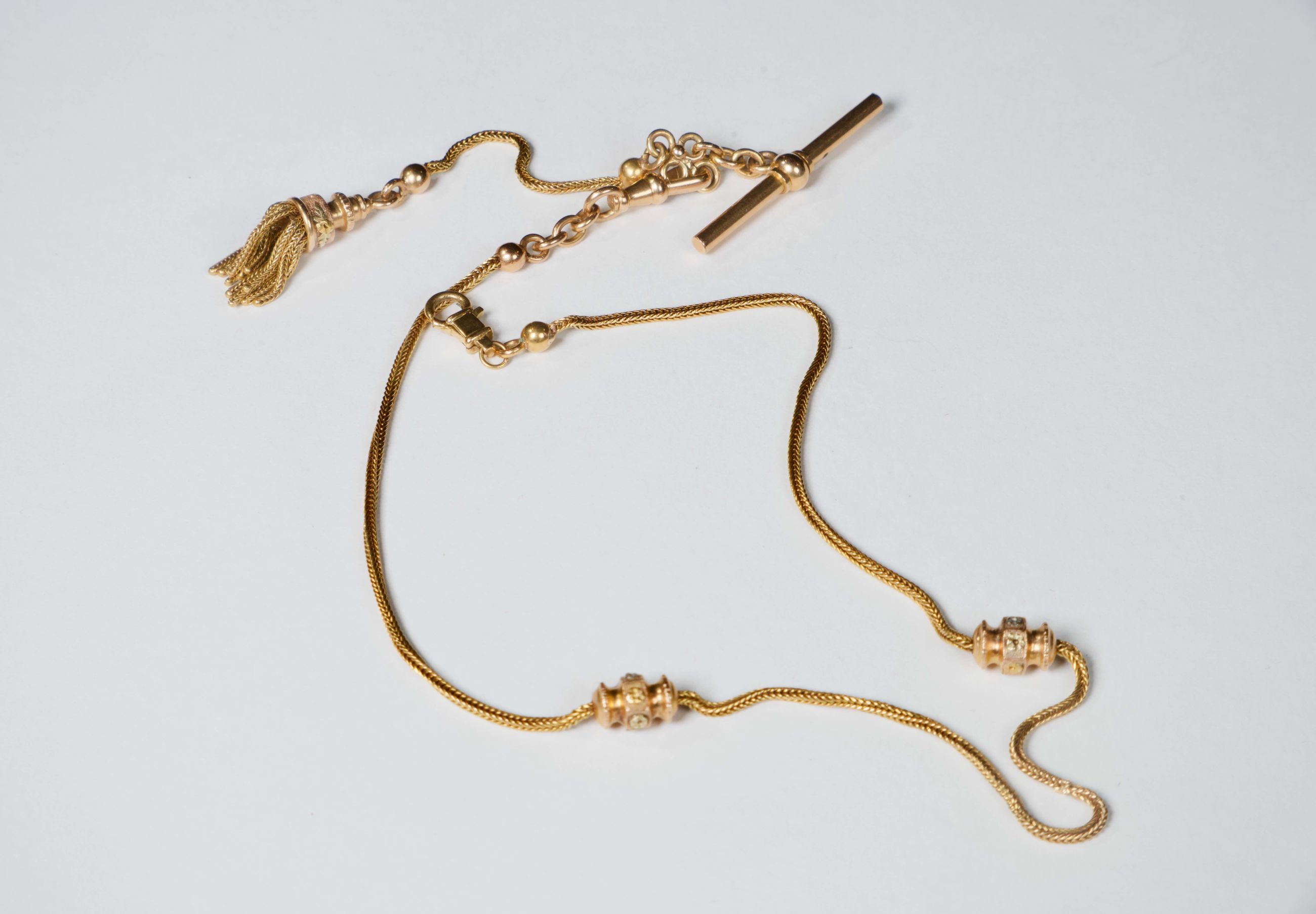 Catena da gilè con nappina. Italia. 1900 ca. Oro e diamanti - Collezione privata Demaldè, Milano