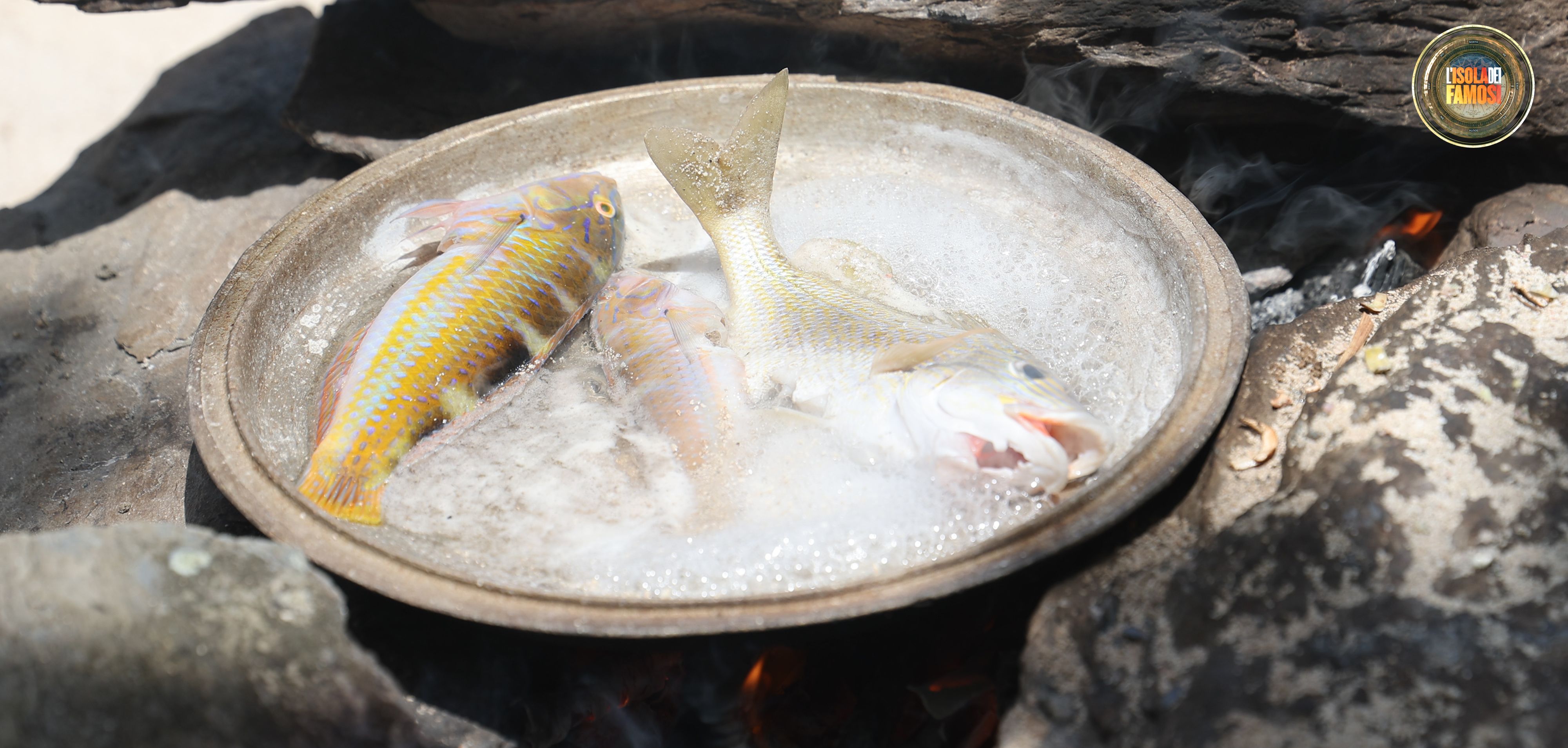 Il menù prevede riso con il pesce appena pescato.