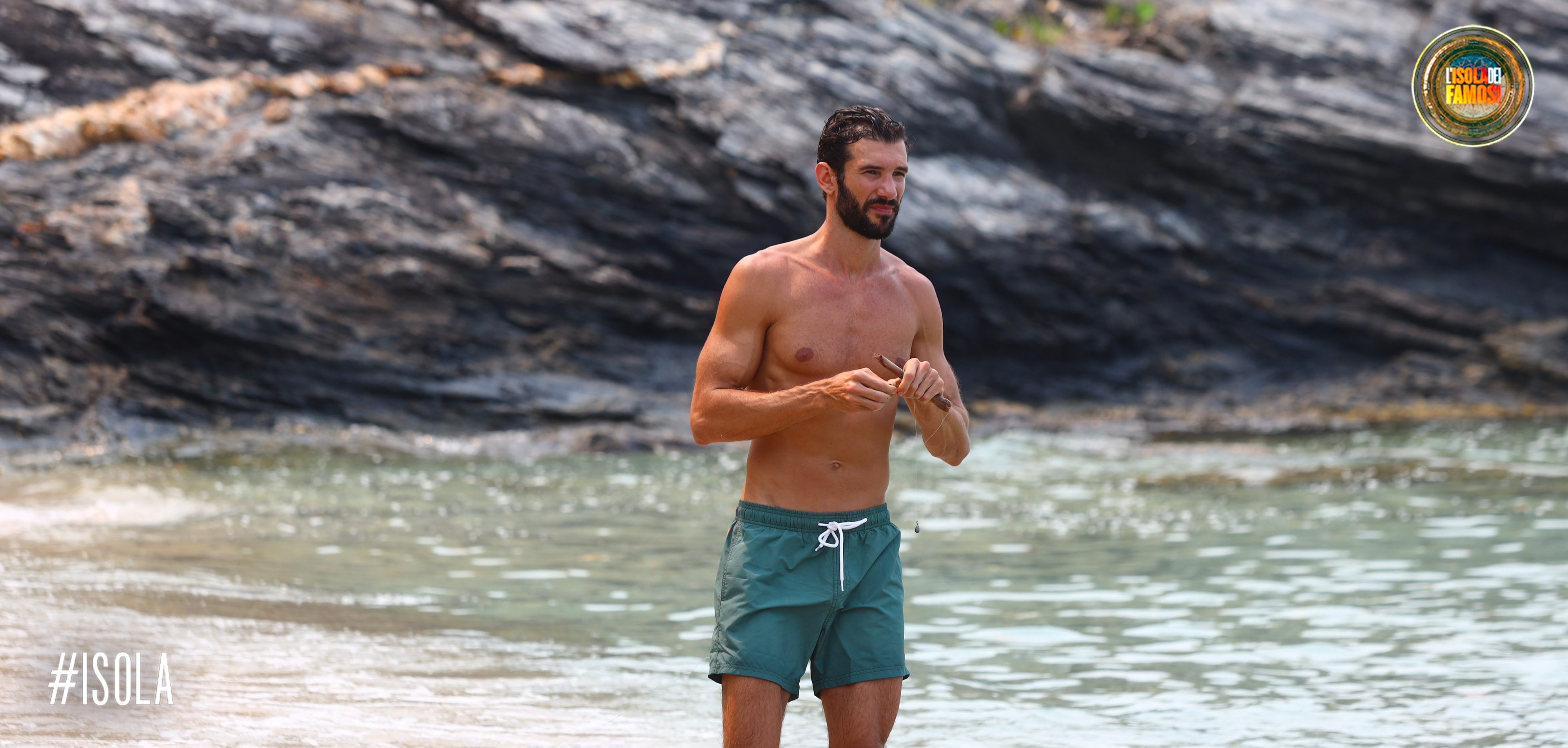 Artur alle prese con la pesca.