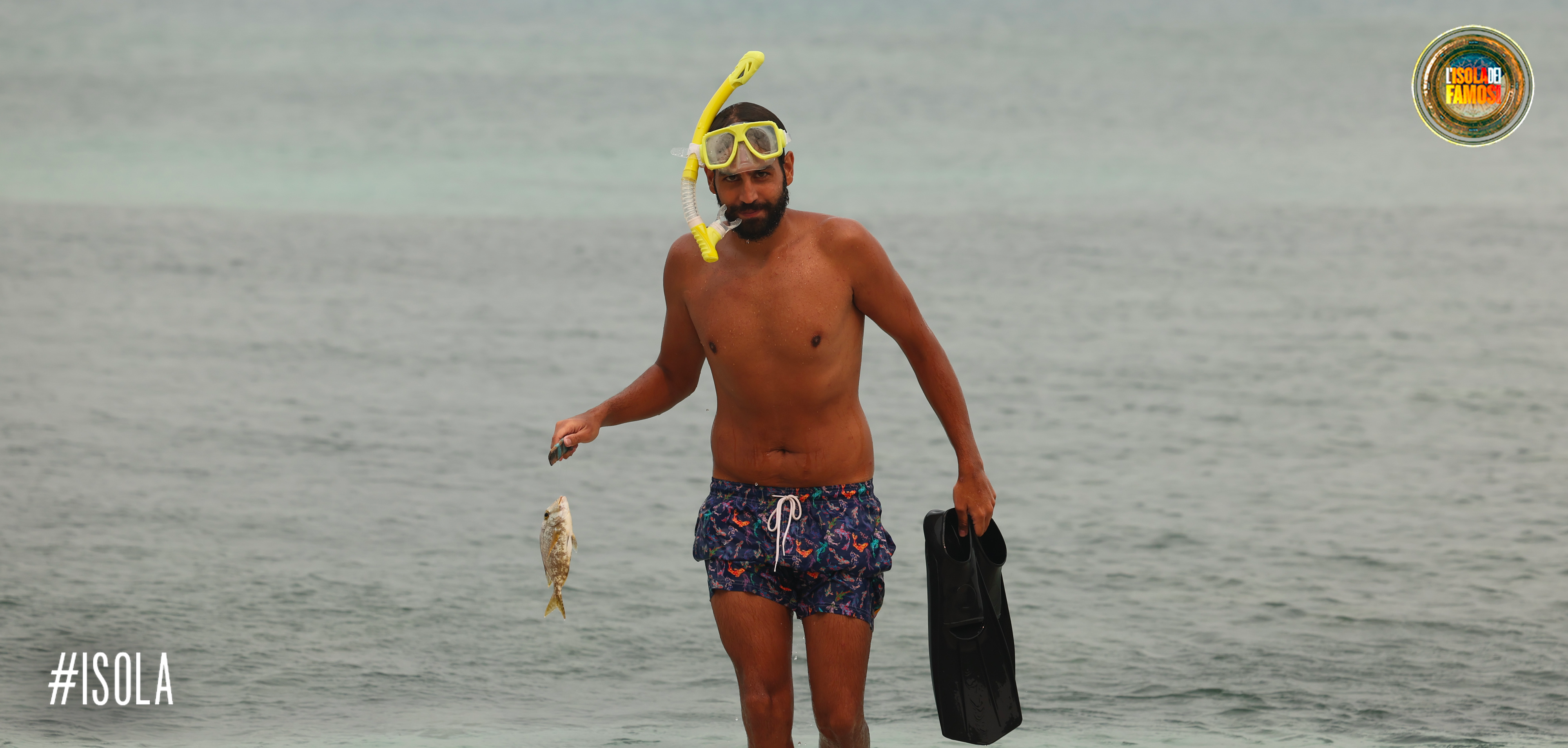 Aras, orgoglioso della sua pesca subacquea.