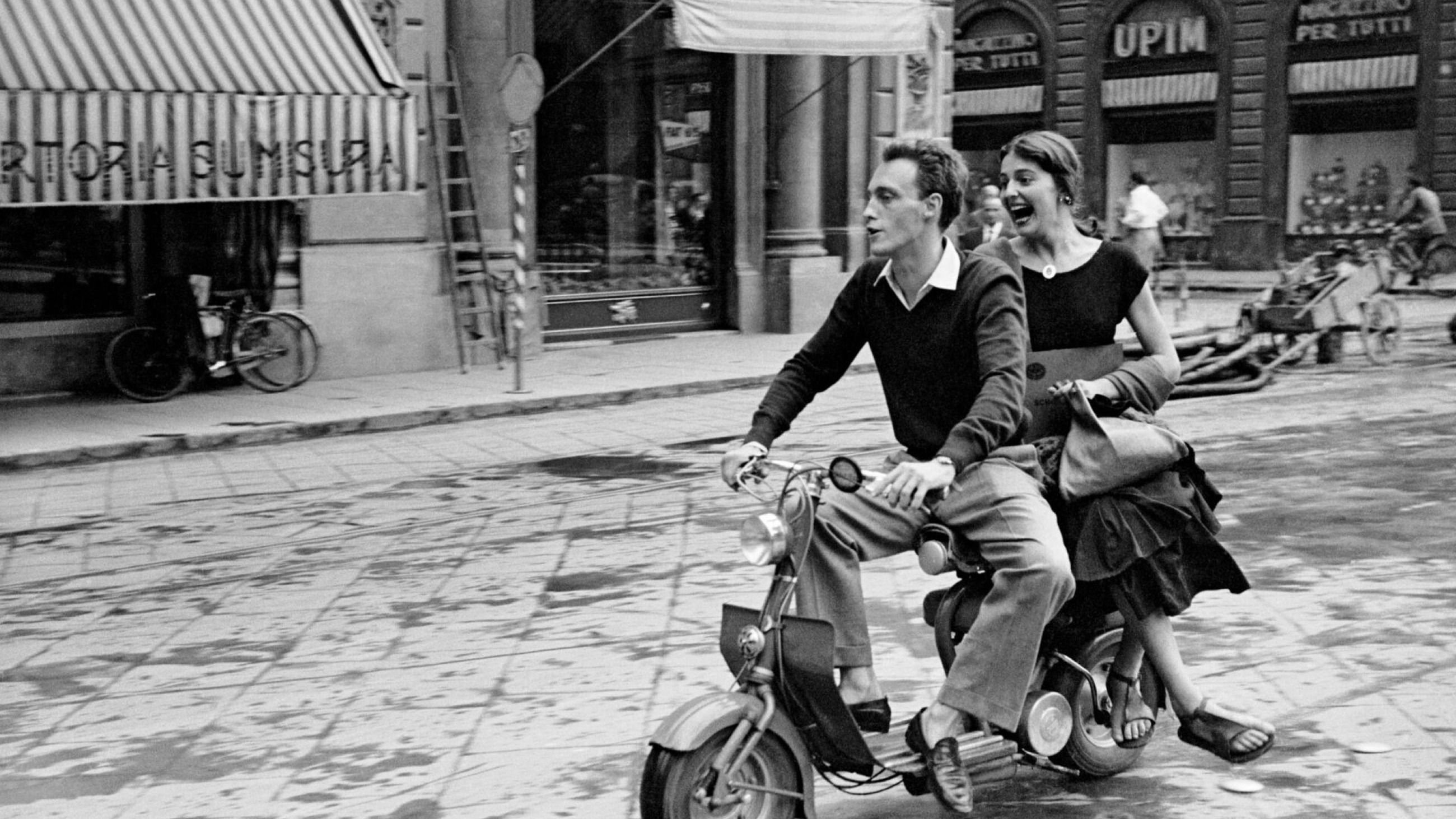 Jinx and Justin on Scooter, Florence – Italy, 1951 - Credits: Courtesy Press Office