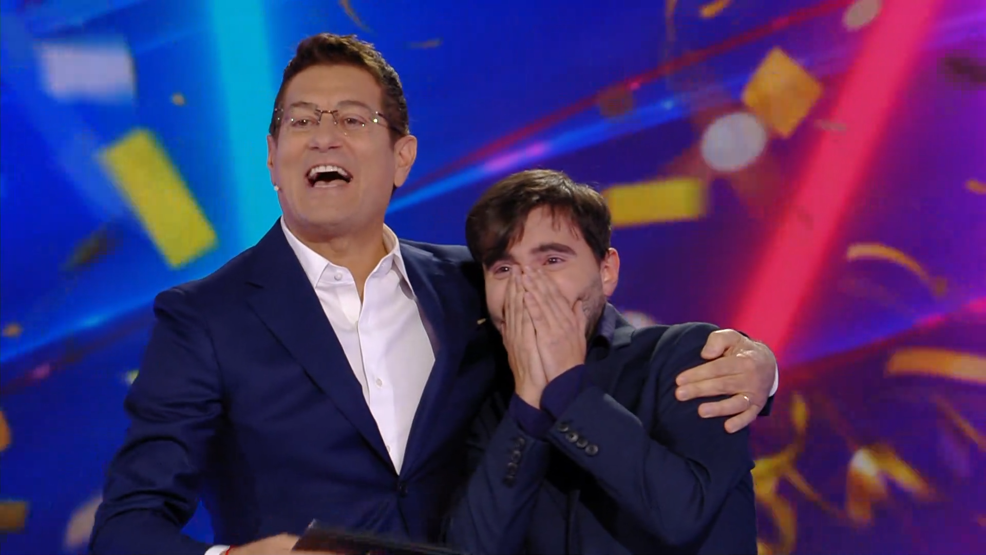 Il campione Marco Briano con Enrico Papi durante la vittoria a Sarabanda