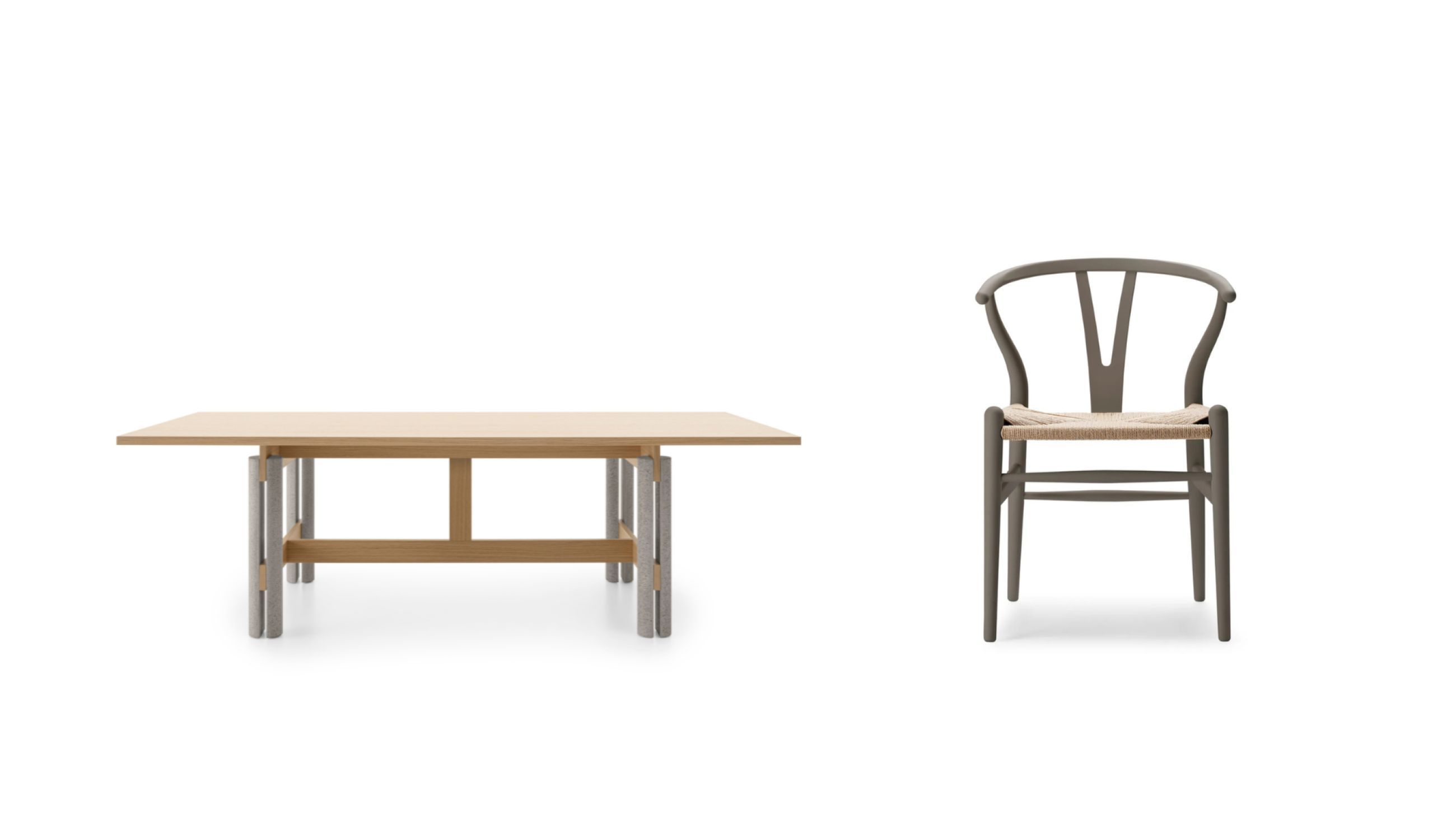 Da sinistra: Tavolo Abaco, B&B Italia, Courtesy B&B Italia; Sedia CH24 Wishbone Chair, Carl Hansen & Søn - Courtesy Carl Hansen & Søn