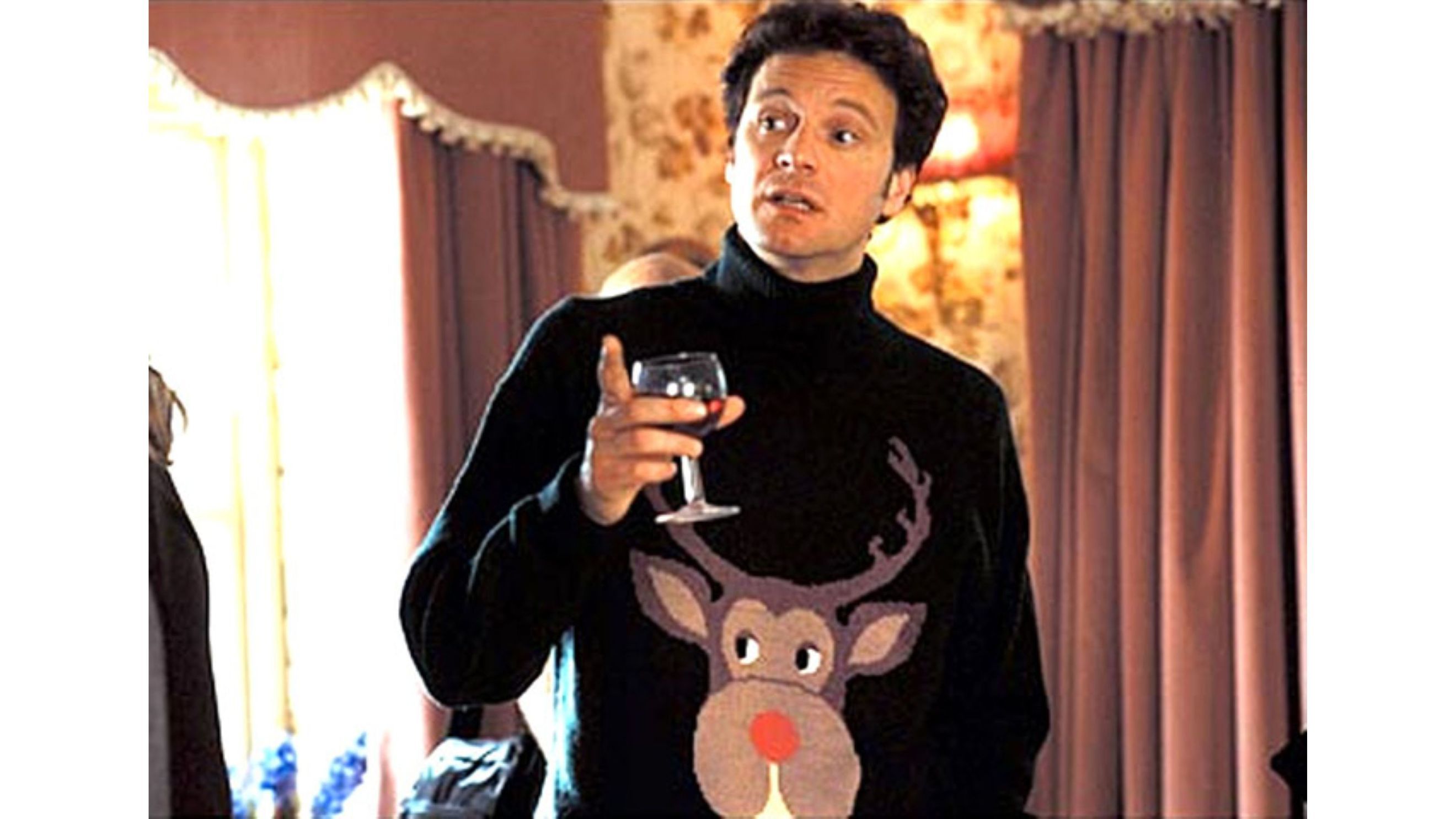 Mark Darcy con il maglione a renna in una scena da “Il Diario di Bridget Jones" - Credits Pinterest