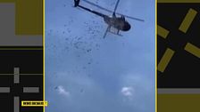 Lluvia de dinero en Míchigan: la razón por la que un helicóptero ha arrojado miles de euros