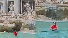 Una turista se lanza a la Fontana de Trevi en Roma y ruega al Policía que no la multe