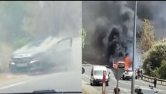 Un coche en llamas en la entrada de San Martín de Valdeiglesias, origen de uno de los incendios que arrasan el suroeste de Madrid