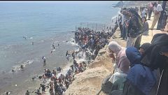 Las impactantes imágenes de miles de migrantes entrando ilegalmente a Ceuta desde Marruecos: la ciudad, desbordada