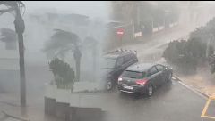 Retenciones en las carreteras en plena tormenta y primeras calles anegadas por el agua en Algemesí, Alzira y Cullera