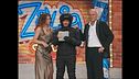 Capocenere arriva in moto a Zelig Circus 2004