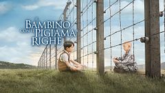 Il bambino con il pigiama a righe