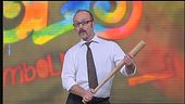 Il signor Verduci con la sua mazza da baseball a Zelig 2012