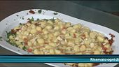 Chicche di gnocchi con spigola, pomodorini e carciofi