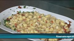Chicche di gnocchi con spigola, pomodorini e carciofi