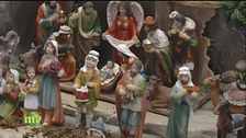 Il presepe e la decorazione della tavola natalizia