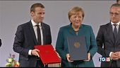 Asse Parigi-Berlino tra cori e proteste