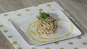 Spaghettoni con bottarga e carciofi