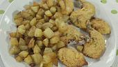 Galletto all'americana con patate sabbiose