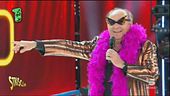 Gerry Scotti e la "mostruosa" imitazione di Renato Zero