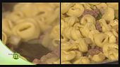 Tortellini con melanzane e salsiccia