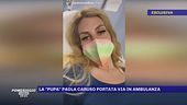 La "pupa" Paola Caruso portata via in ambulanza