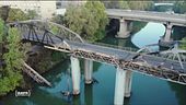 Il ponte romano avvolto dal fuoco, immagini di una città decadente?