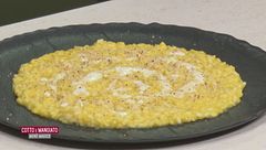 Risotto con crema di taleggio e granella di nocciole