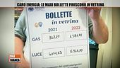 Caro energia: le maxi bollette finiscono in vetrina