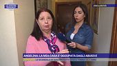 Angelina, davanti la casa che le era stata assegnata e che ora è occupata abusivamente