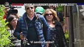 Gisella scortata dalle guardie del corpo come una star
