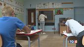 Due alunni e una maestra