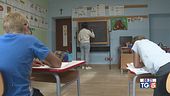 Due alunni e una maestra