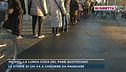 Milano, la lunga coda del pane quotidiano