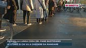 Milano, la lunga coda del pane quotidiano