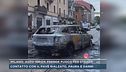 Milano, auto ibrida prende fuoco per strada
