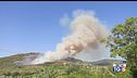 Caldo torrido, incendi e forti precipitazioni