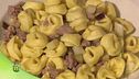 Tortellini melanzane e salsiccia e tortellini al gratin