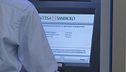 Il bancario spione non era solo