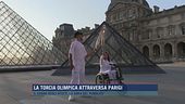 La torcia olimpica attraversa Parigi