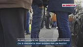 Milano, la gente che chiede cibo al Pane quotidiano