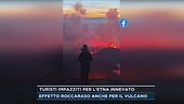 Turisti impazziti per l'Etna innevato