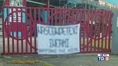 Striscione di minacce contro i testimoni