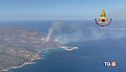 In fuga dalle fiamme, piogge al centronord