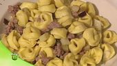 Tortellini con melanzane e salsiccia e tortellini al gratin