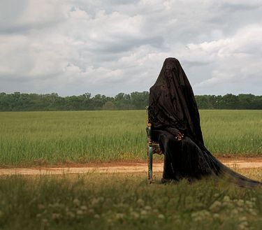 The woman in the yard