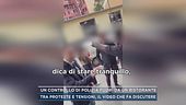 Un controllo di polizia fuori da un ristorante