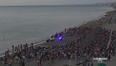 Alba sulla spiaggia tra le note di violino