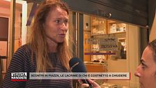 Scontri in piazza, le lacrime di chi è costretto a chiudere