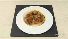 Risotto all'aglio nero, cozze e pecorino