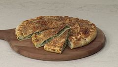 Torta salata con cicoria e salsiccia